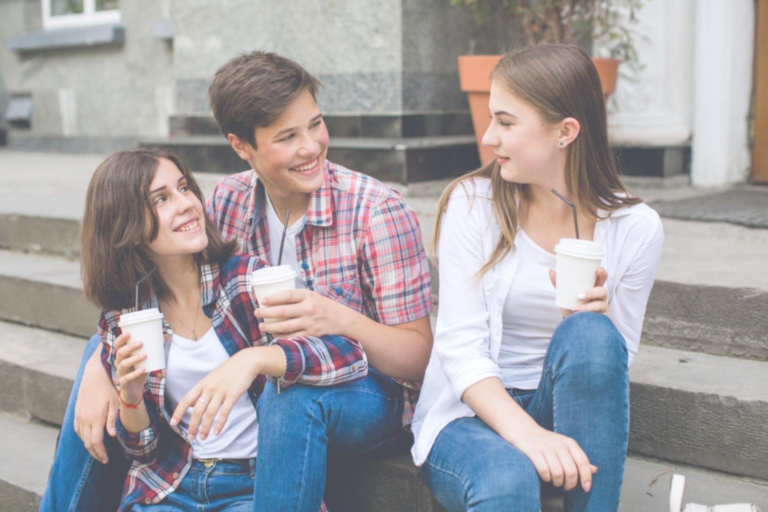 Students engaged in investment learning discussion